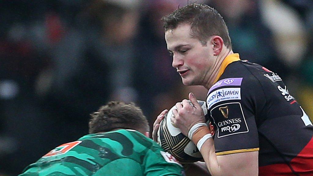 Treviso's Irne Herbst tackles Hallam Amos of Dragons