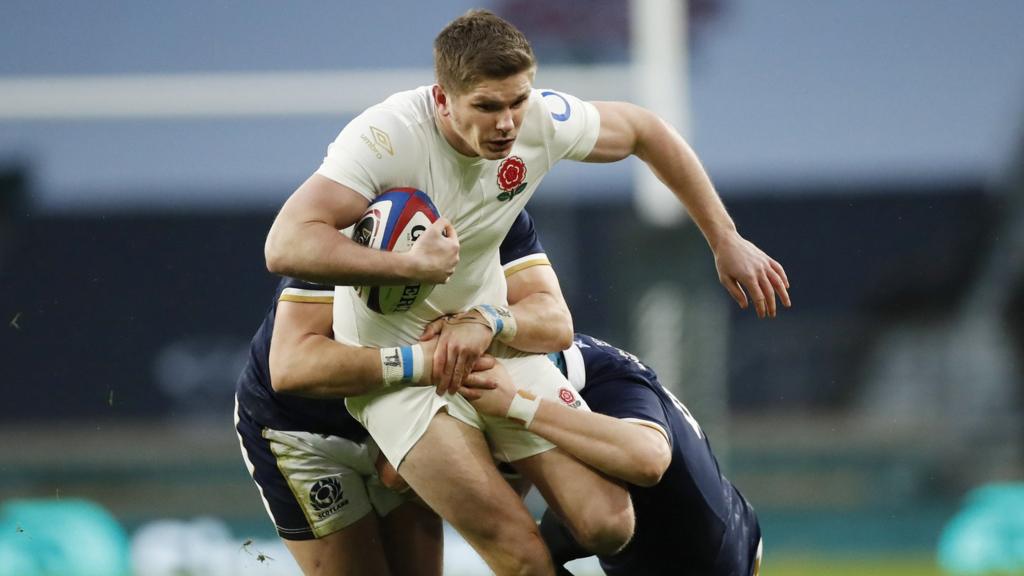 Owen Farrell is tackled