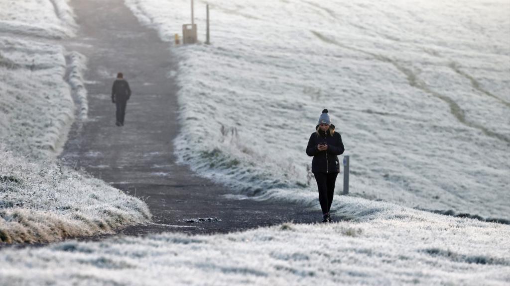 A person walks in Epsom, Surrey on Dec 8, 2022