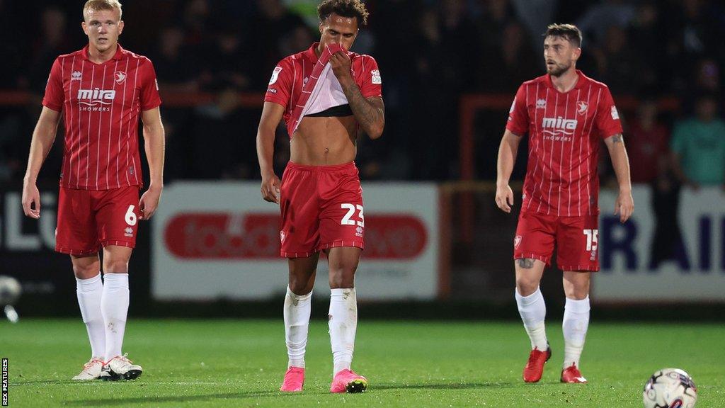 Cheltenham Town players look dejected