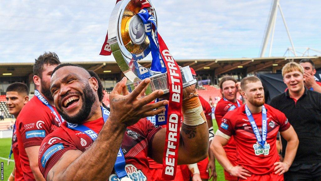 Emmanuel Waine lifts the Championship promotion final trophy after London stunned Toulouse in the Promotion decider