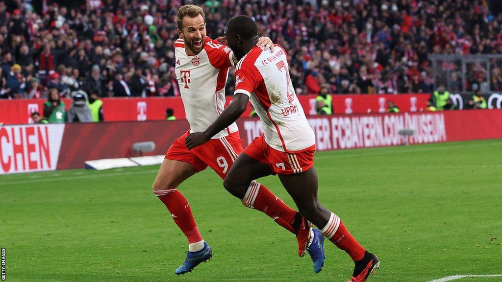 Harry Kane celebrates scoring for Bayern