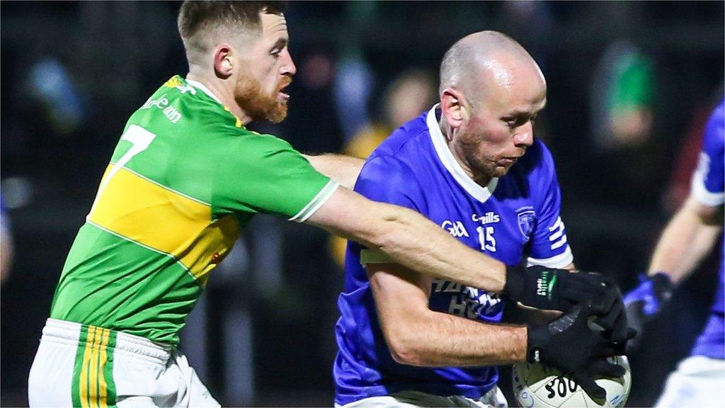 Glen's Cathal Mulholland challenges John O'Malley in the semi-final