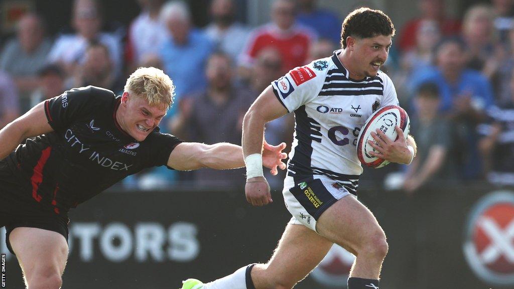 Patrick Pellegrini runs with the ball