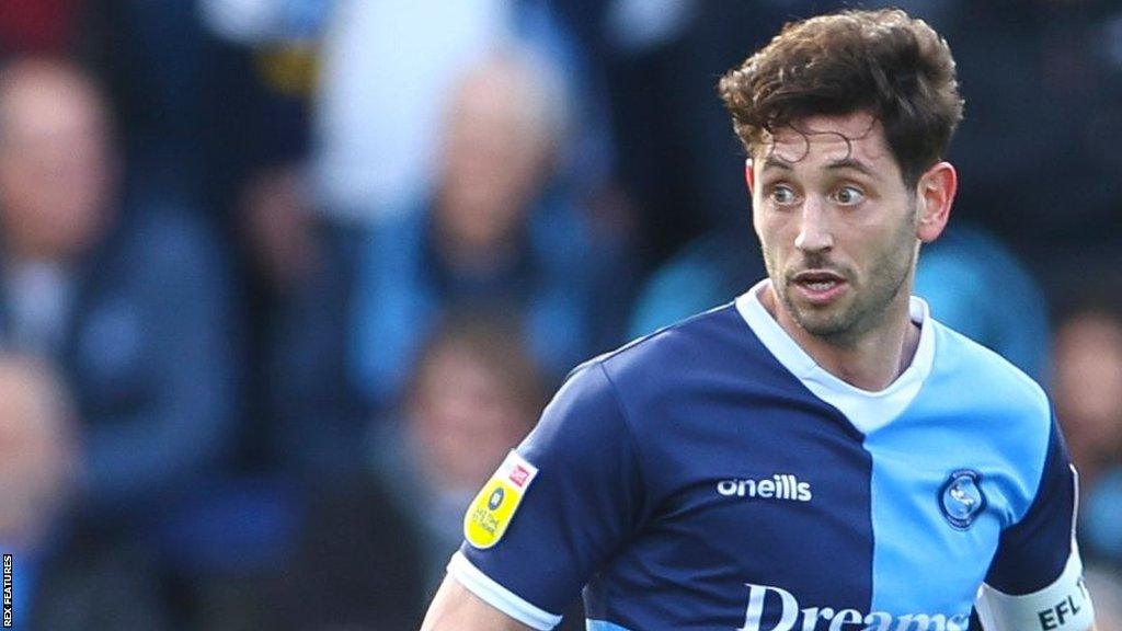 Joe Jacobson in action for Wycombe