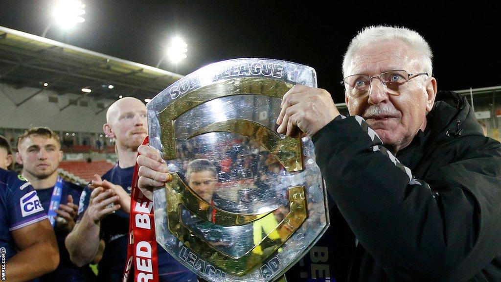 Wigan Warriors chairman Ian Lenagan holds the League Leaders' Shield