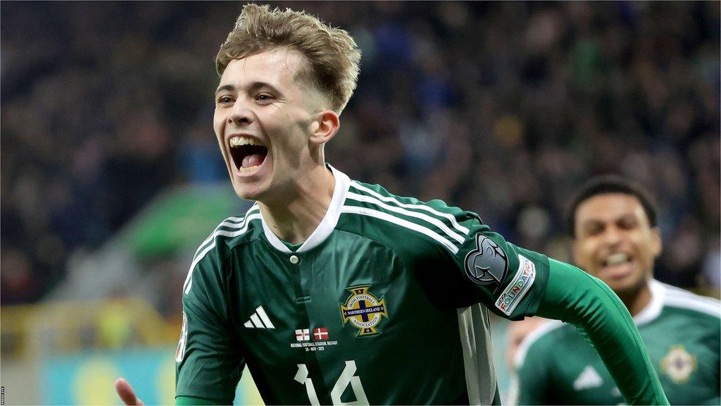 Isaac Price opens the scoring for Northern Ireland against Denmark