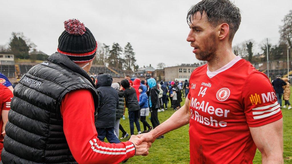 Tyrone joint manager Feargal Logan shakes hands with Mattie Donnelly after the team's win at Clones