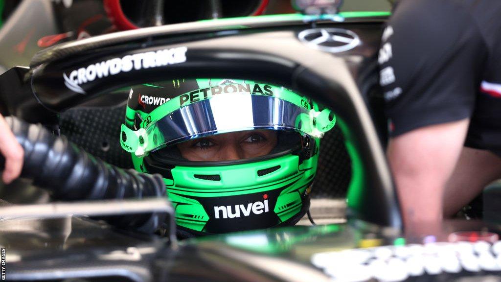 George Russell sits in the cockpit of his Mercedes in Bahrain