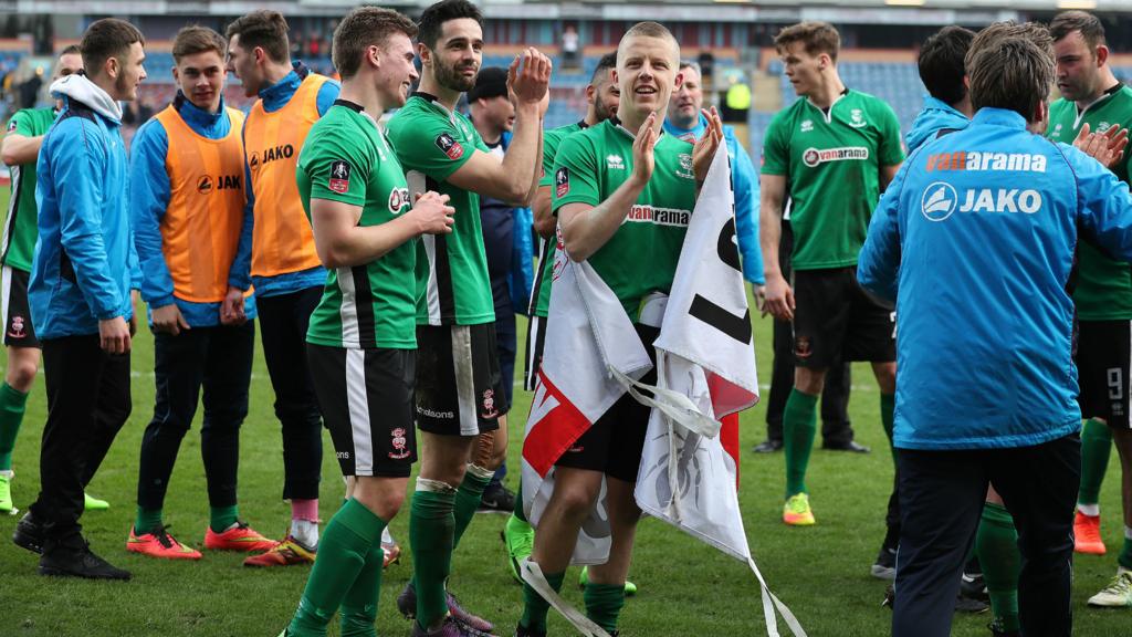 Lincoln City celebrate win at Burnley