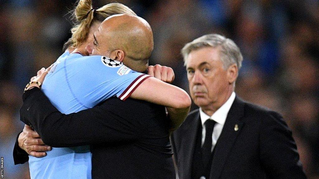 Carlo Ancelotti looks on as Manchester City celebrate