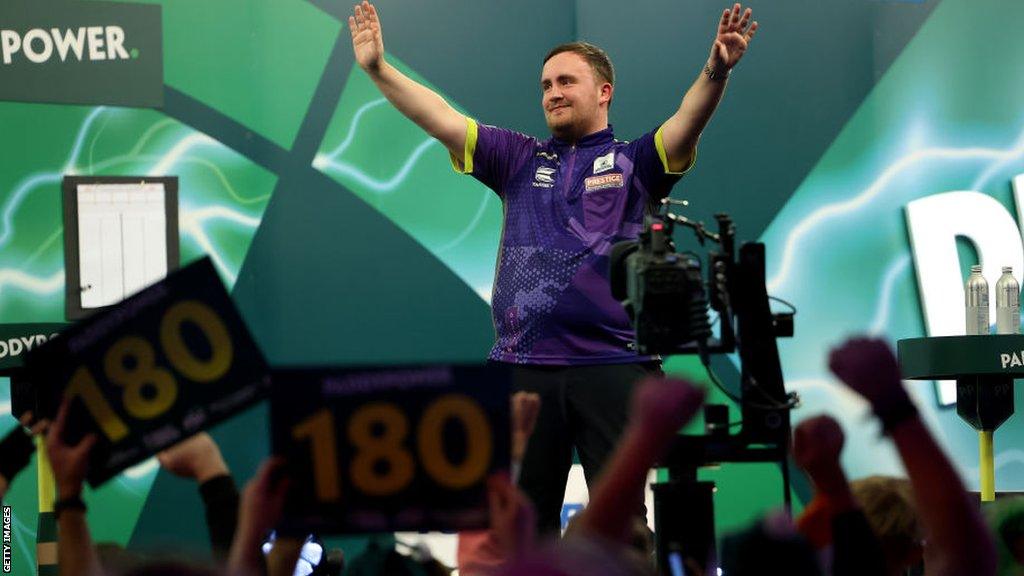 Luke Littler celebrates victory at the World Darts Championship