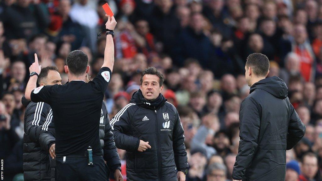 Fulham manager Marco Silva is shown a red card by referee Chris Kavanagh during his side's FA Cup quarter-final defeat at Manchester United