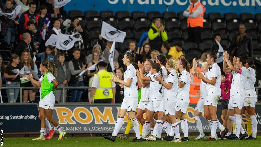 Swansea City Women players celebrate