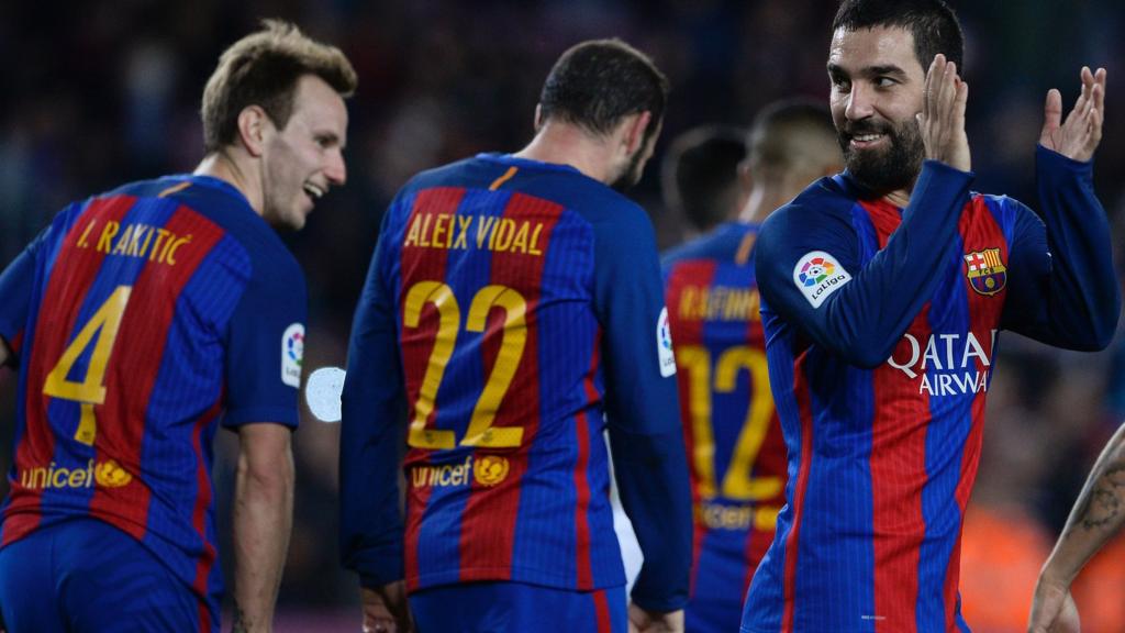 Arda Turan celebrates