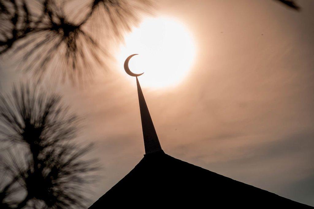 moon emblem on top of a building