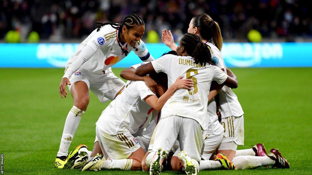 Lyon celebrate after Amel Majri scores against Paris St-Germain