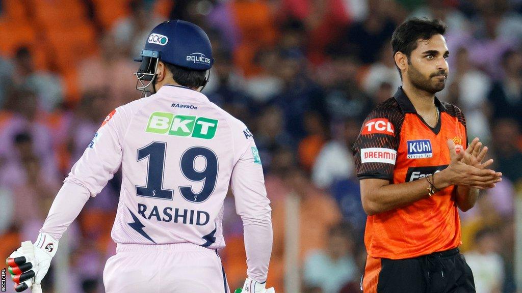 Bhuvneshwar Kumar of Sunrisers Hyderabad celebrates the wicket of Rashid Khan of Gujarat Titans in the Indian Premier League