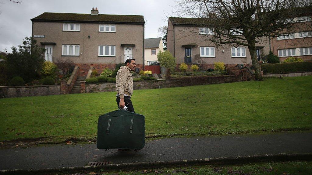 Picture of man carrying bag