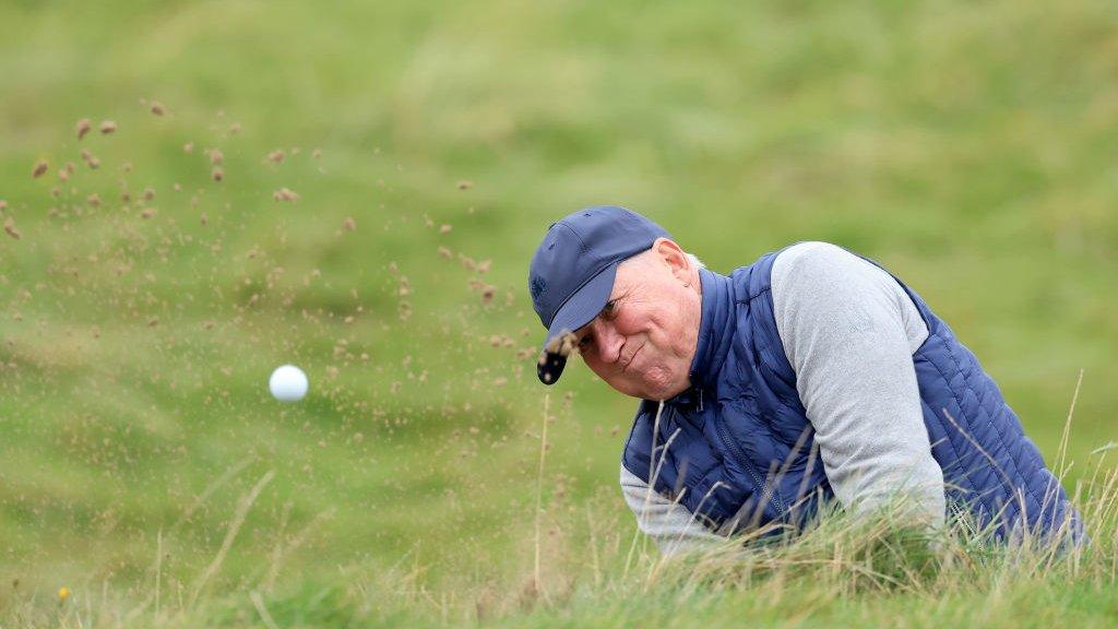 Martin Slumbers playing out of a bunker on the Old Course at St Andrews