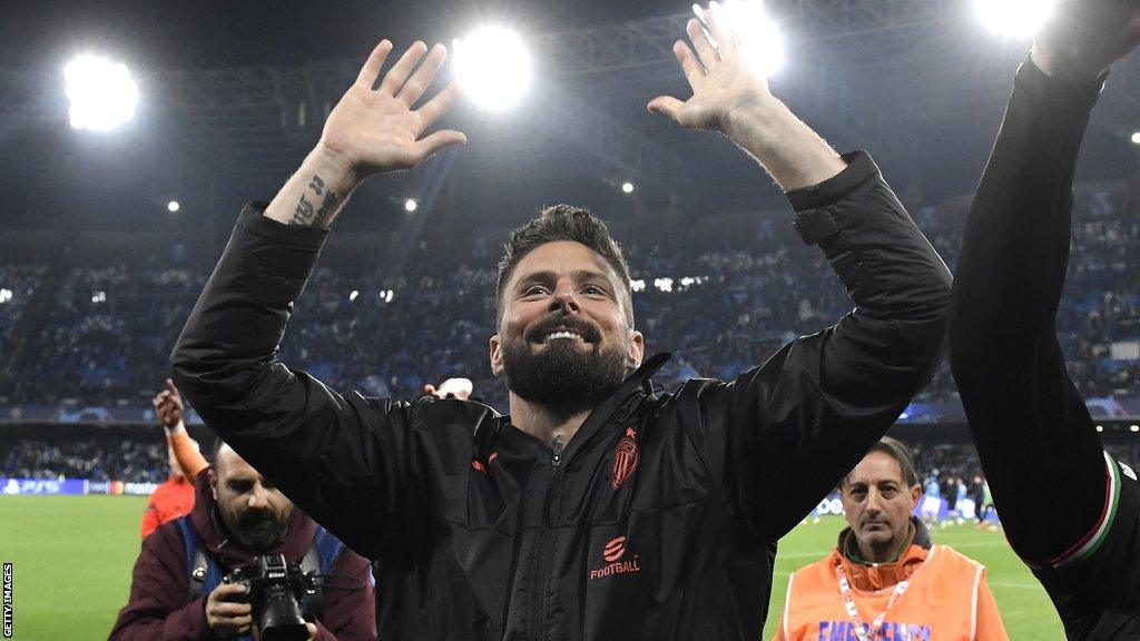 Olivier Giroud celebrates after AC Milan's Champions League win over Napoli