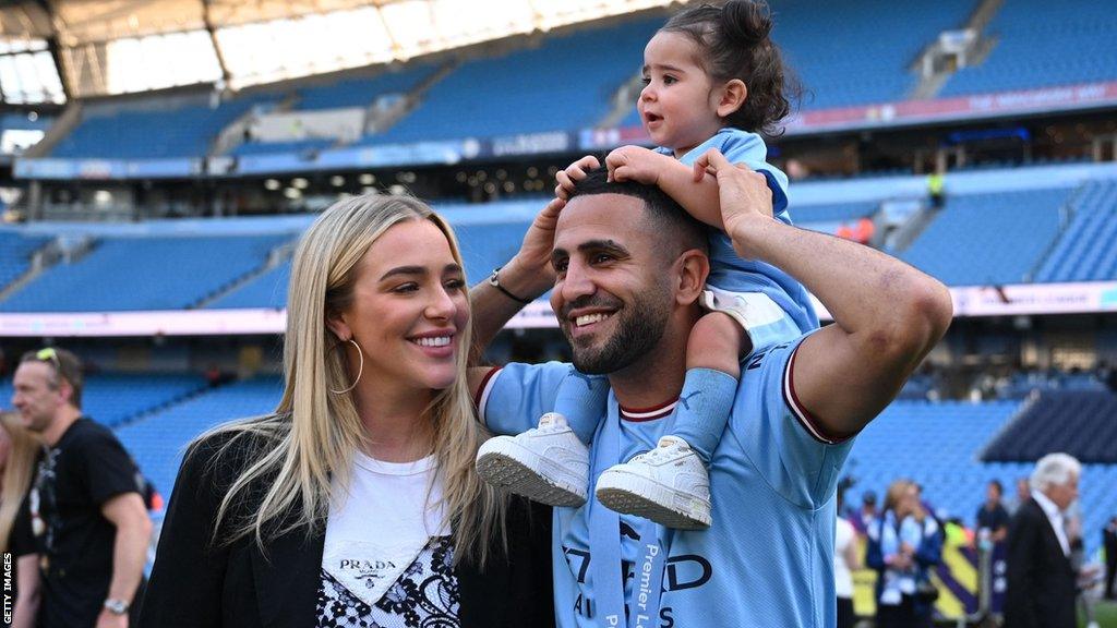 Riyad Mahrez with wife Taylor Ward and their daughter.