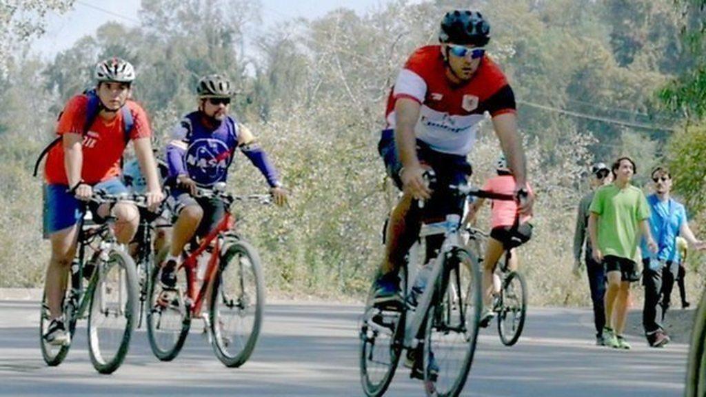 A number of cyclists on the road