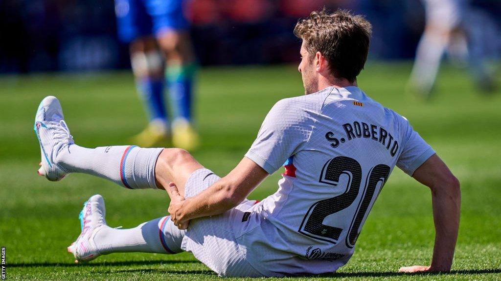 Barcelona defender Sergi Roberto goes down injured during the match against Getafe