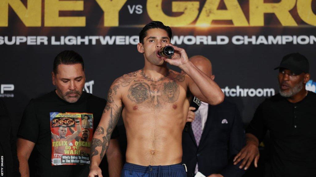 Ryan Garcia downs a beer at a weigh-in