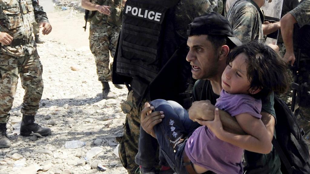 Migrants cross from Greece into Macedonia. Photo: 2 September 2015