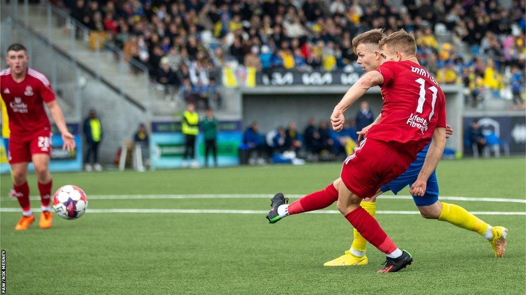 Callum Bratley goes close for the Nomads in the second half