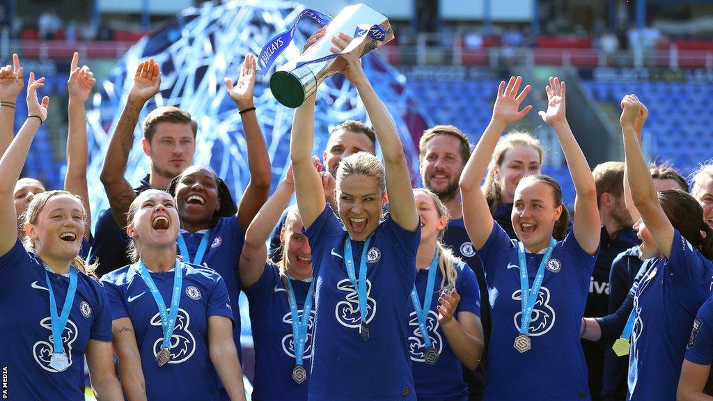 Chelsea celebrate with the Women's Super League title