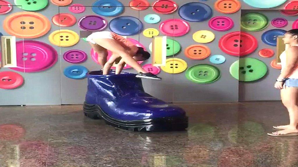 Handstand on a giant shoe - naturally!