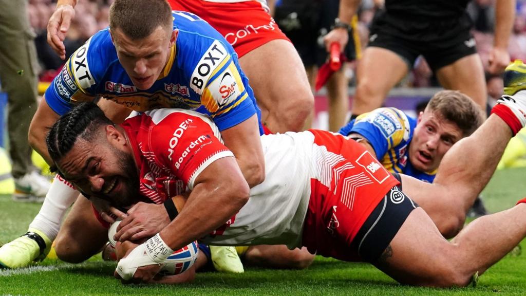 St Helens' Konrad Hurrell is stopped short of scoring a try