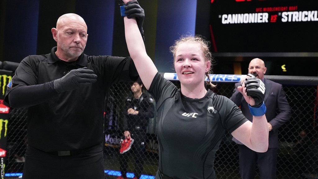 Cory McKenna is declared the winner after her victory over Cheyanne Vlismas