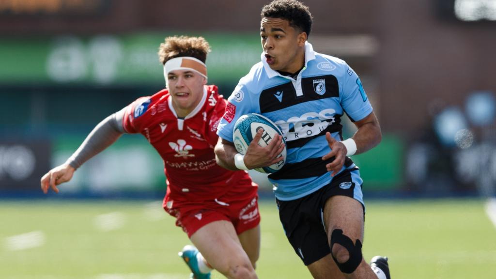 Cardiff's Theo Cabango evades Tom Rogers of Scarlets