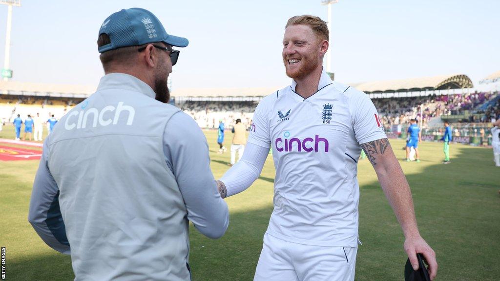 Captain Ben Stokes celebrating with coach Brendon McCullum