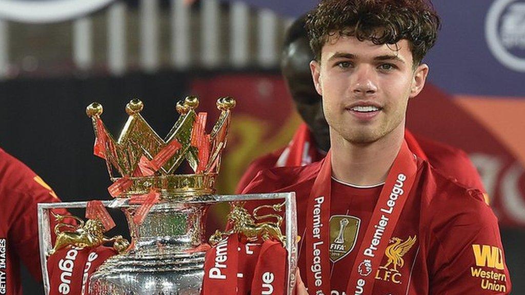 Neco Williams with the Premier League trophy in 2020