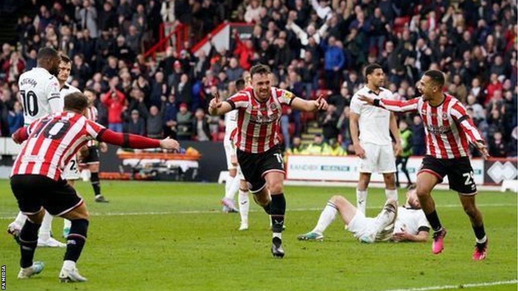 Jack Robinson celebrates