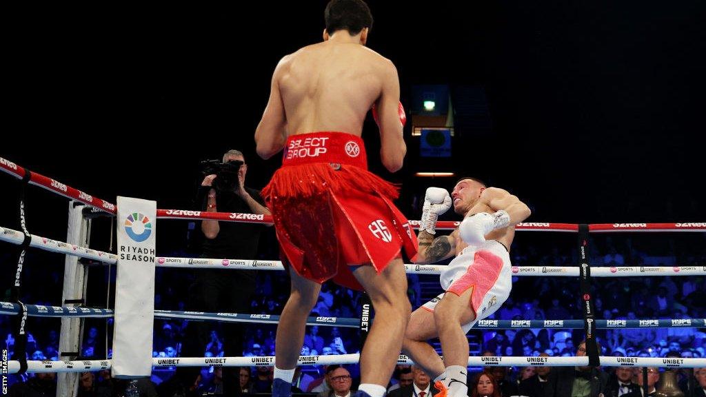 Hamzah Sheeraz watches as Liam Williams goes down