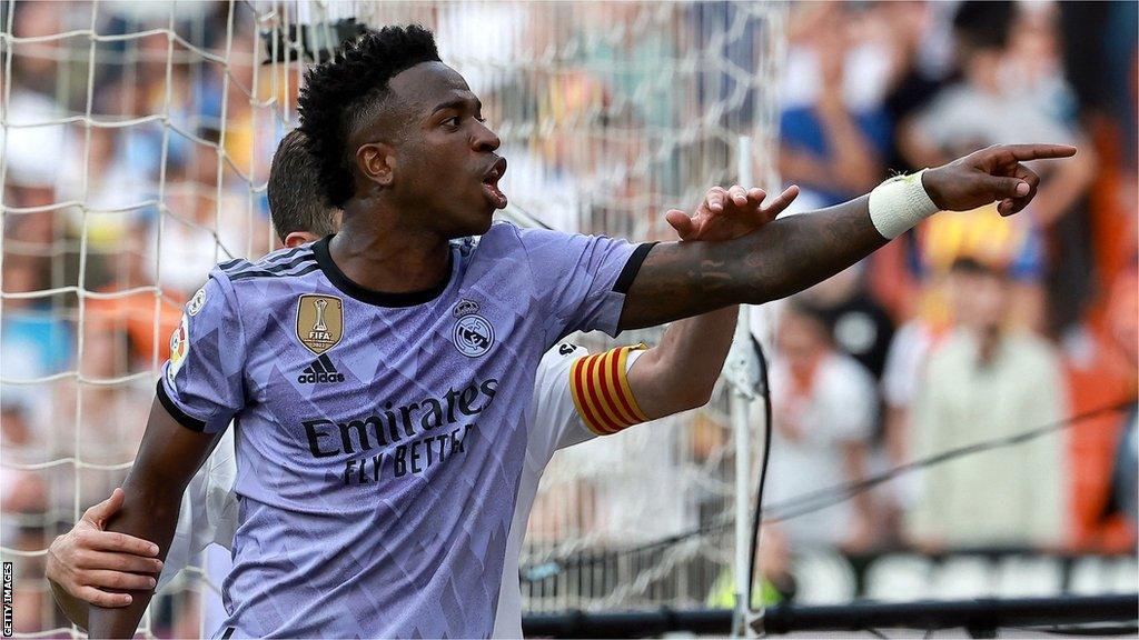 Vinicius Jr points to Valencia fans in the Mestalla Stadium