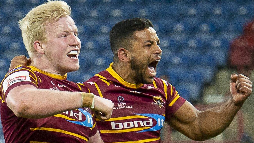 Huddersfield celebrate a try