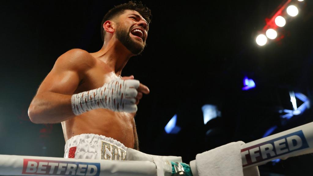 Joe Cordina celebrates on the ropes