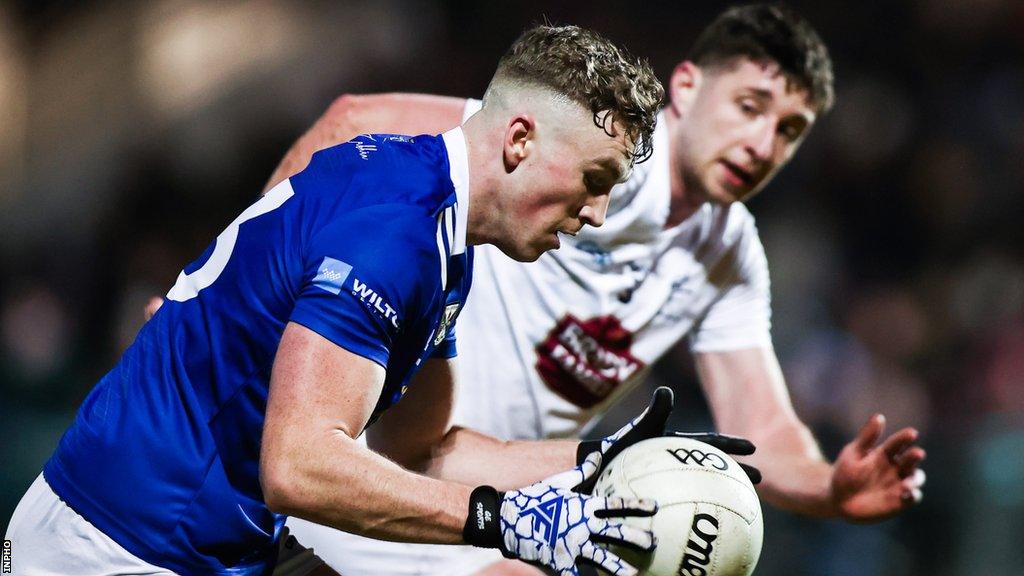 Cavan's Paddy Lynch attempts to get around Kildare's Shea Ryan in Carlow