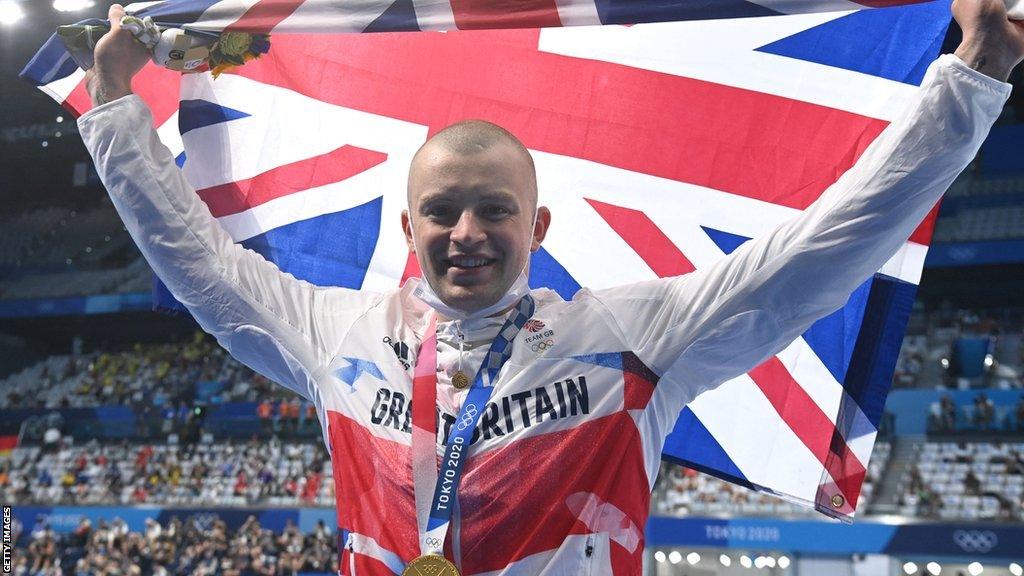 Adam Peaty celebrates winning Olympic gold in Japan