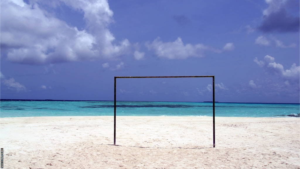 An image of a goal post on a beach in the Marshall Islands