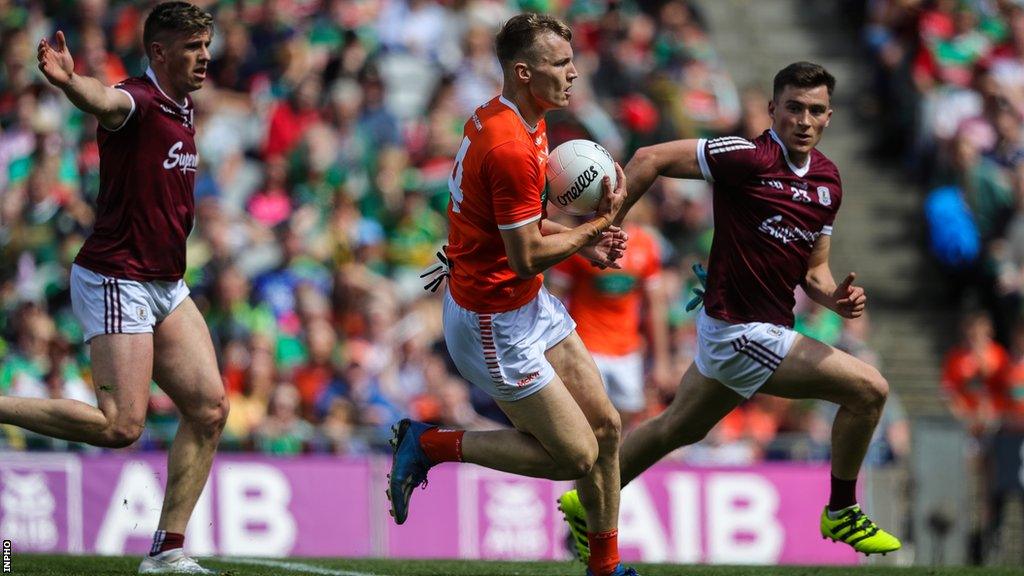 Galway's Shane Walsh is unable to keep pace with Armagh's Rian O'Neill in last year's All-Ireland quarter-final at Croke Park