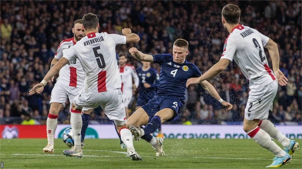 Scott McTominay has an effort on goal for Scotland