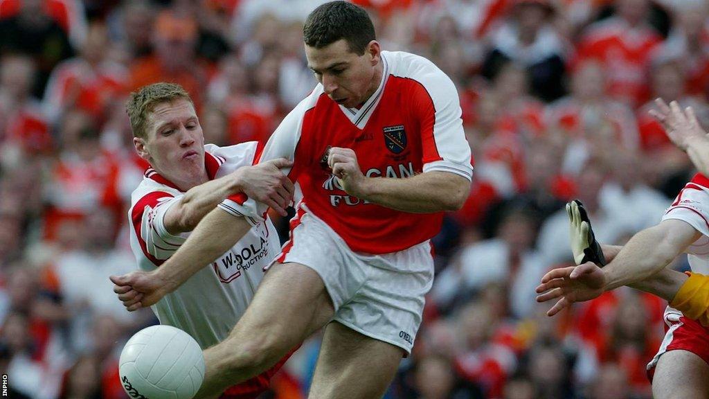 Cormac McAnallen (left) challenges Armagh's Diarmaid Marsden in the 2003 All-Ireland Football Final