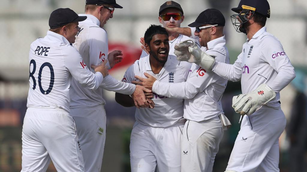 England players celebrate a wicket